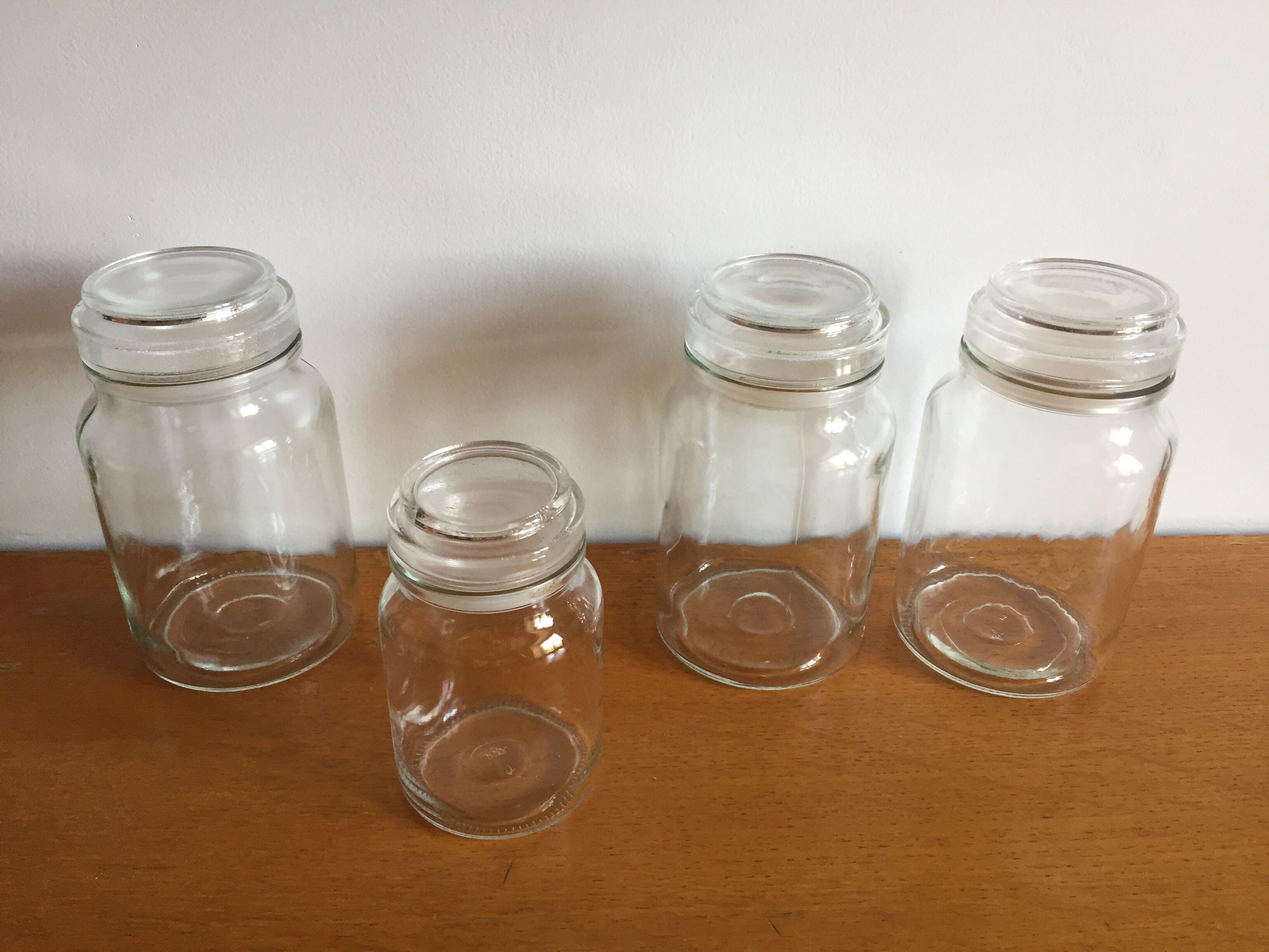 Lot of 4 vintage glass jars