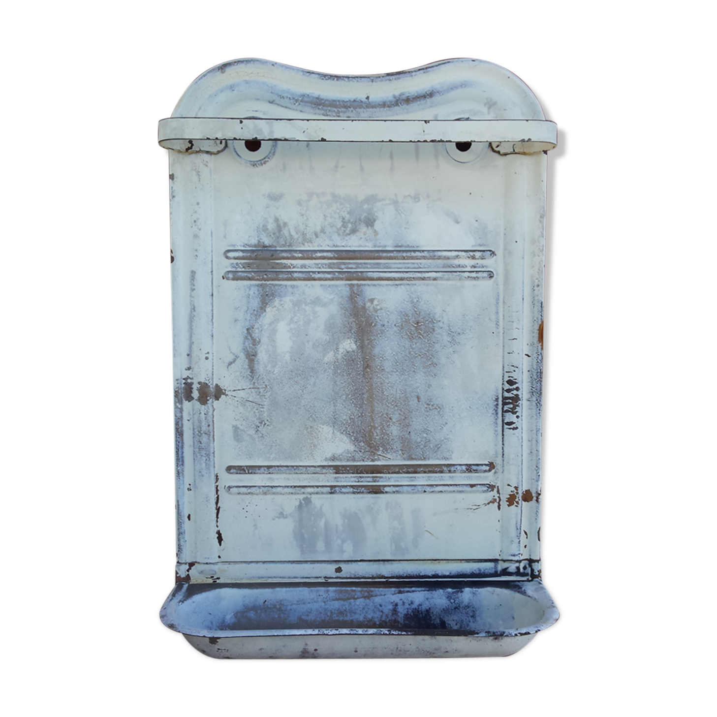 White ladle hangs with bowl