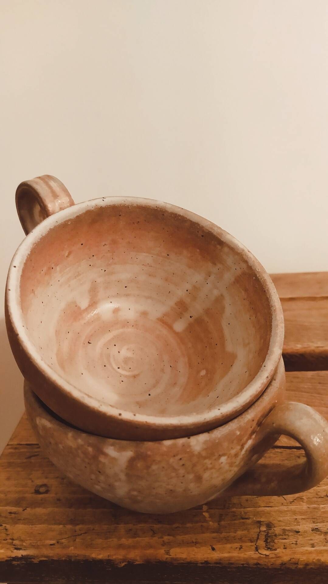 Pair of antique stoneware cups