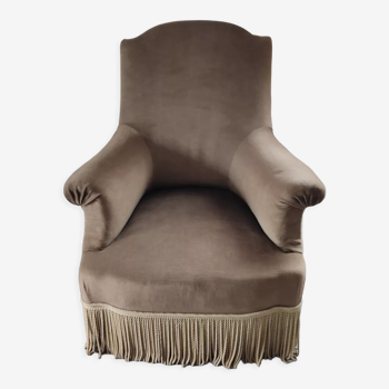 Fauteuil en velours vert