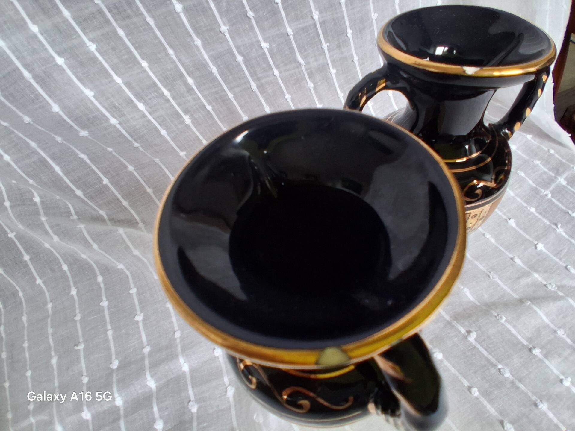 Pair of vases in ancient Greek style gilded with 24-carat gold.