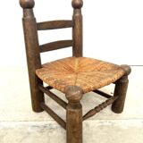 Brutalist chair in wood and straw