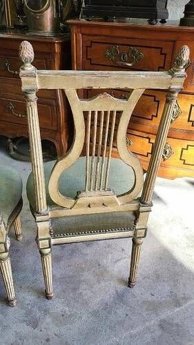Pair of Louis XVI style chairs from the 18th century with lyre back.