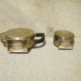 Set of a teapot and a silver metal sugar bowl