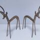 five vintage brass sculptures of gazelles, antelopes, and a giraffe