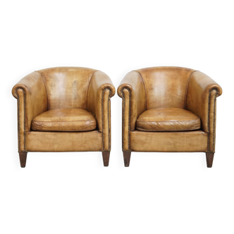 Lot de 2 fauteuils club en cuir de mouton par Nico van Oorschot