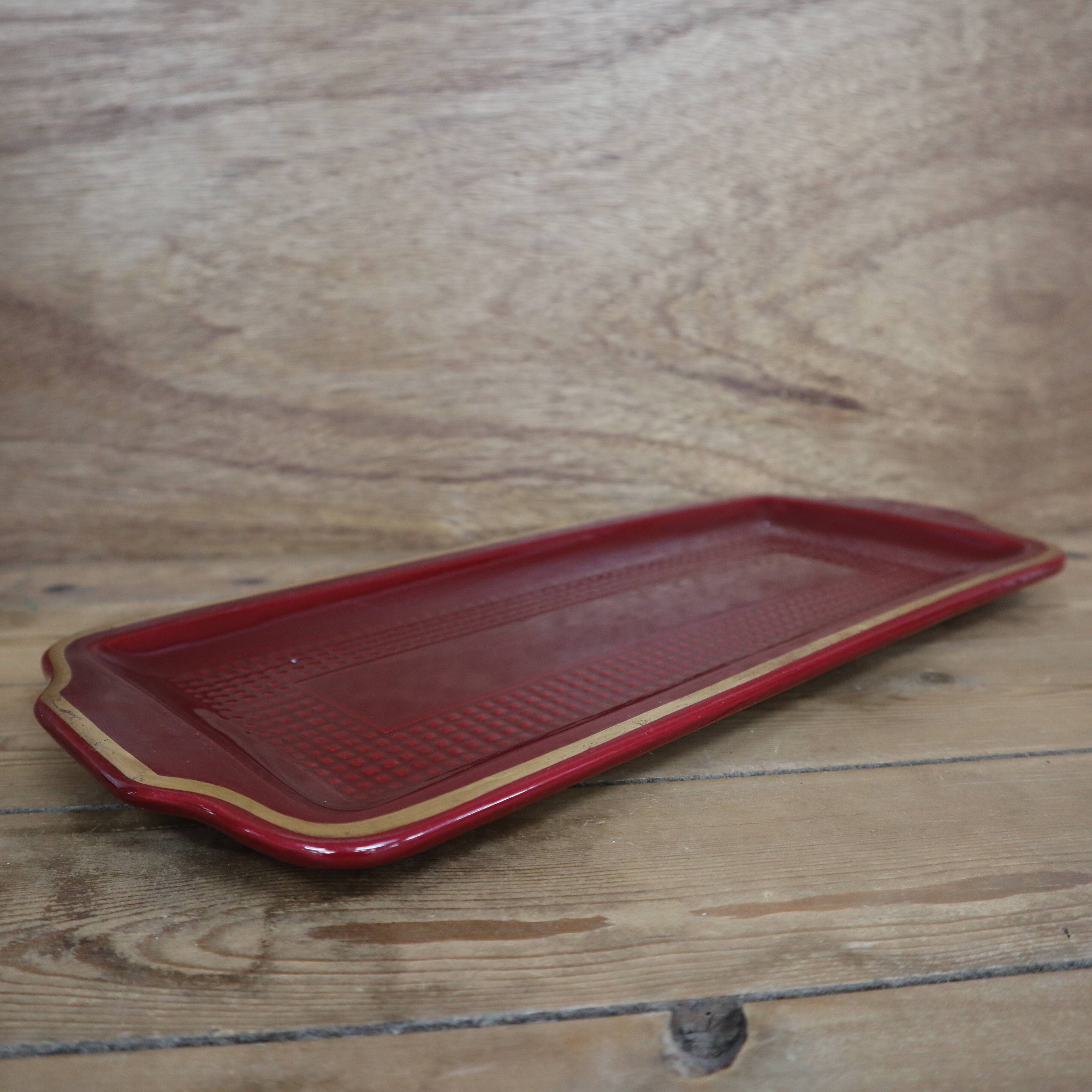 Saint Clément burgundy cake dish with gold trim