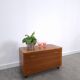 Vintage teak Danish chest with a lid on wheels, toy chest.