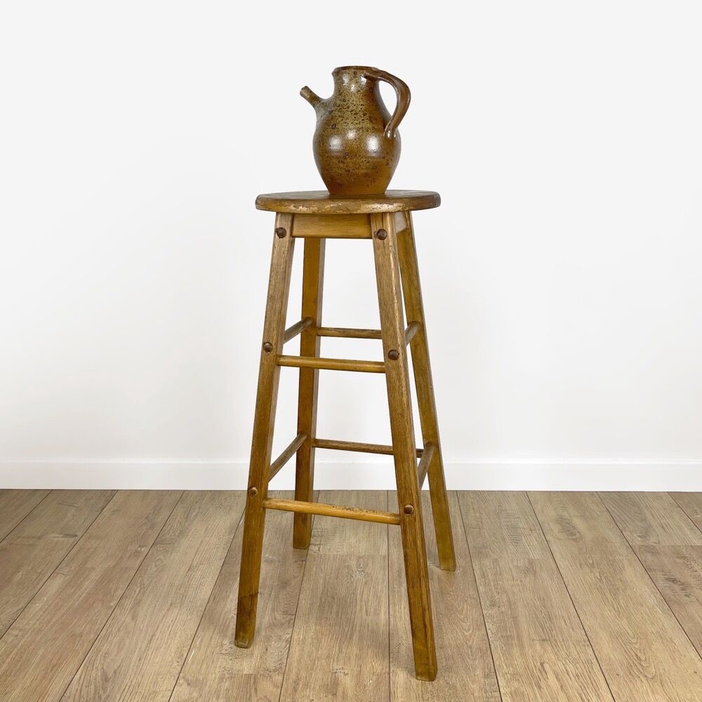 Round vintage wooden bar stool
