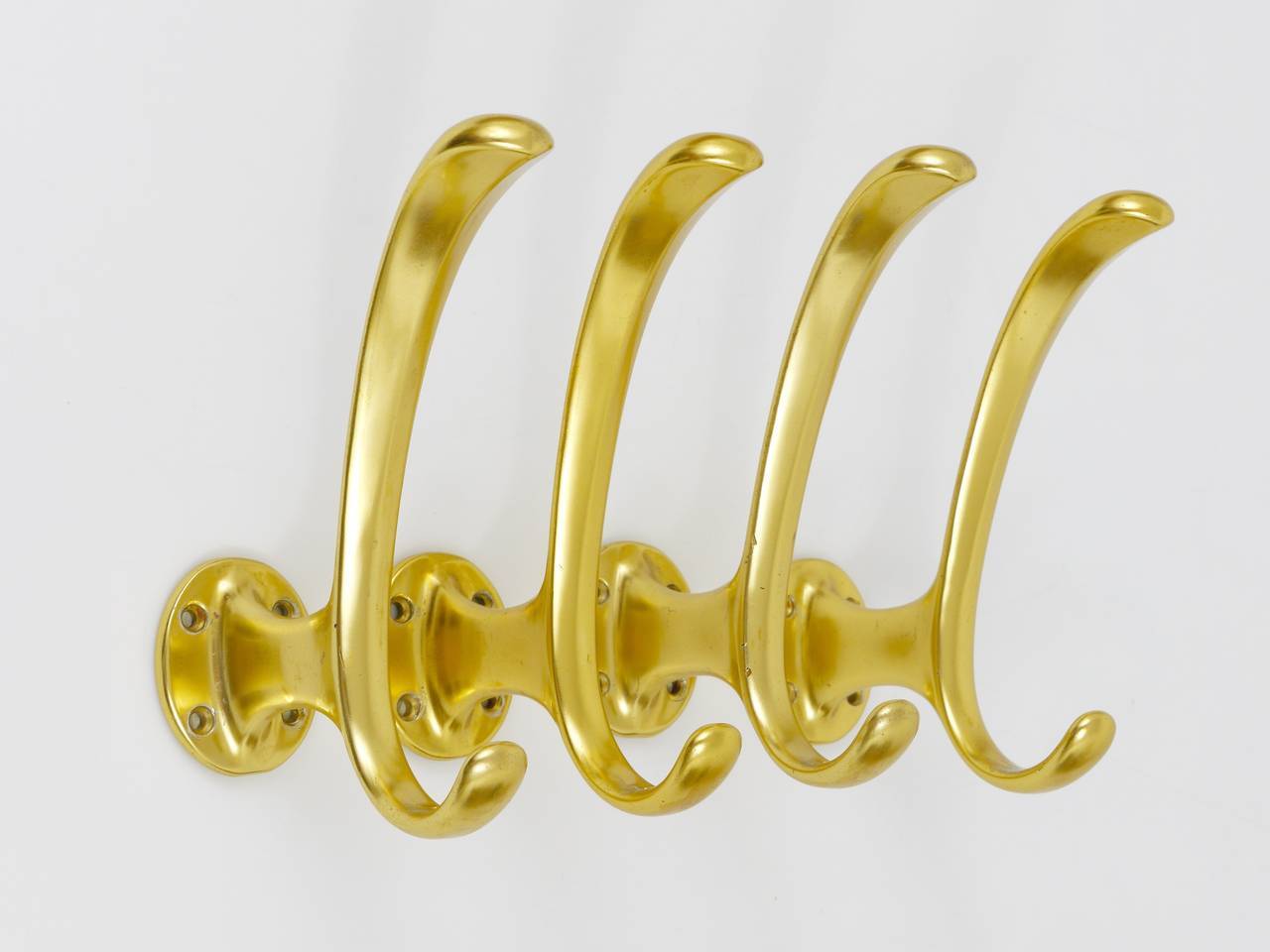 Set of four mid-century golden wall hooks, Austria, Vienna, 1950s.