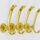 Set of four mid-century golden wall hooks, Austria, Vienna, 1950s.