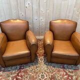 Pair of art deco leather club armchairs