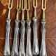 Set of knives and forks for fruits.