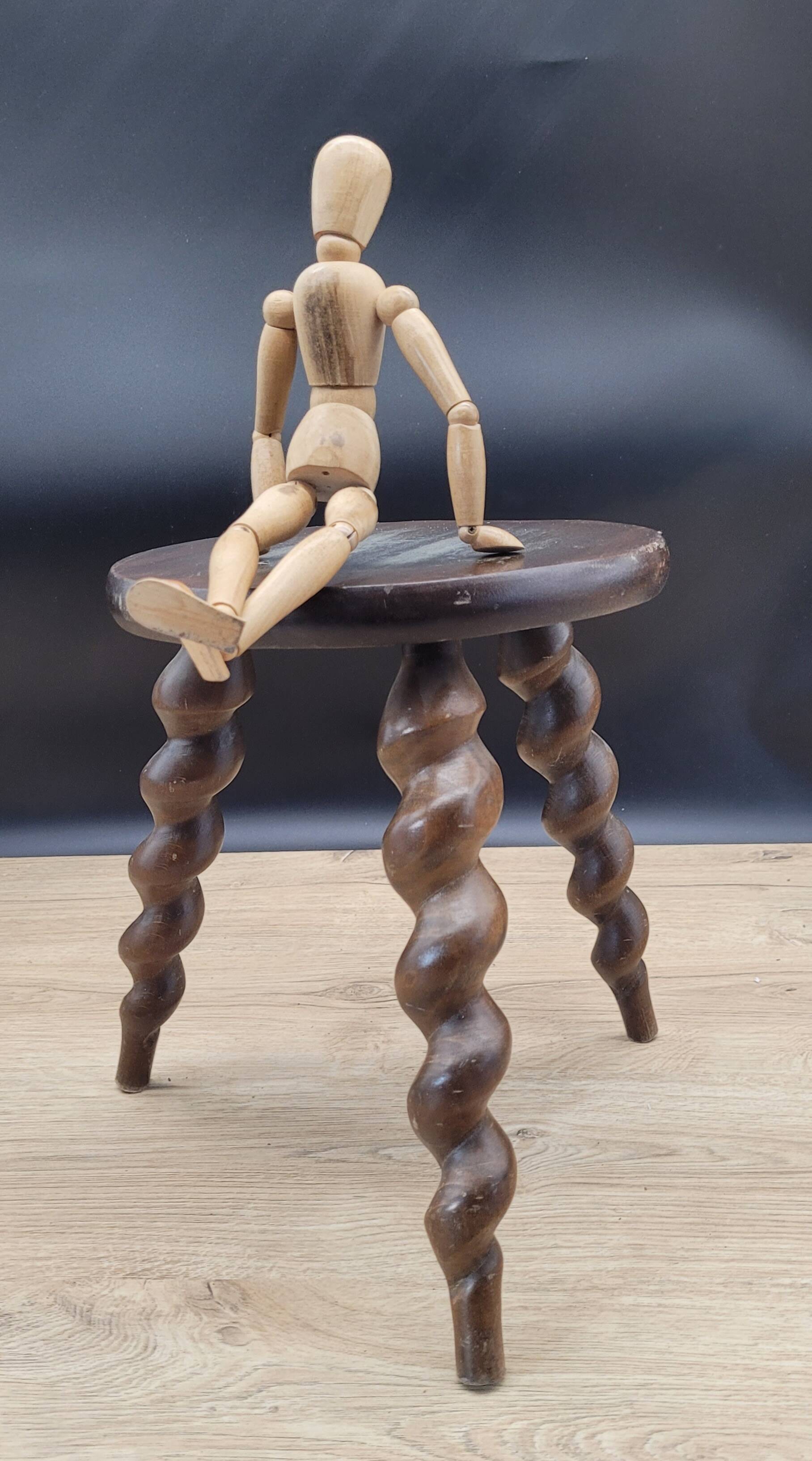 Tripod stool with turned legs
