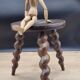 Tripod stool with turned legs