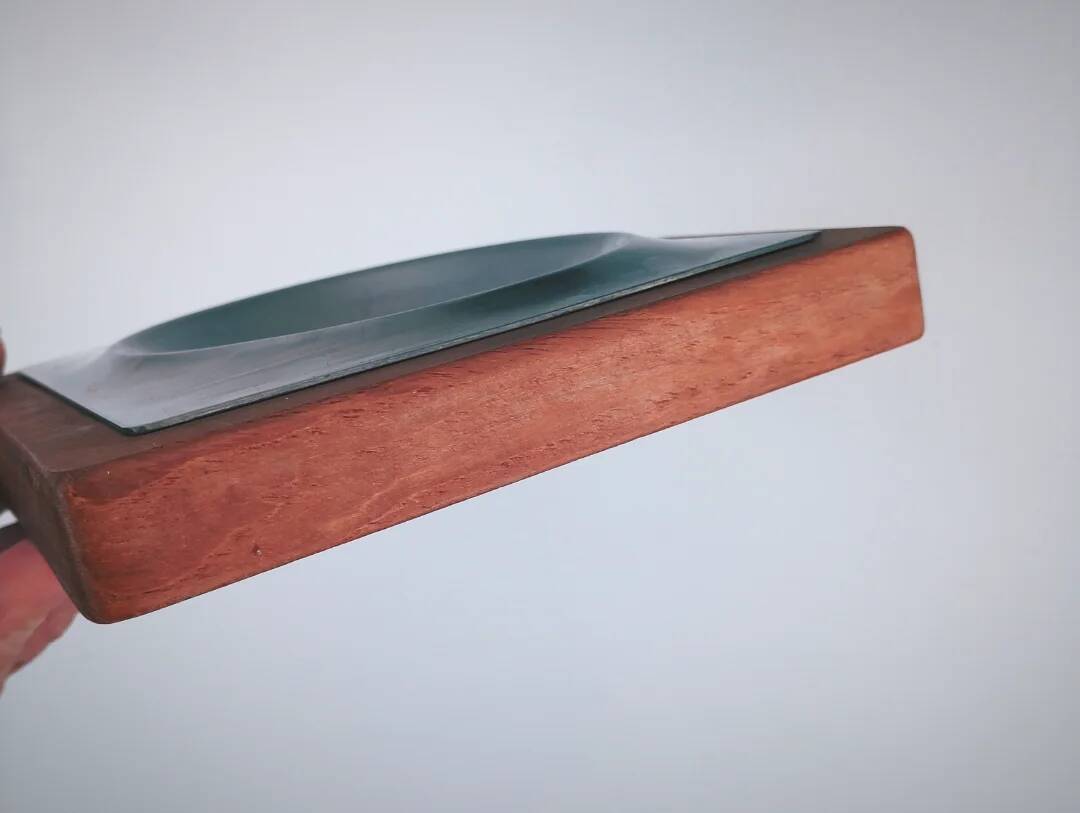 Stainless steel and wood pocket emptier