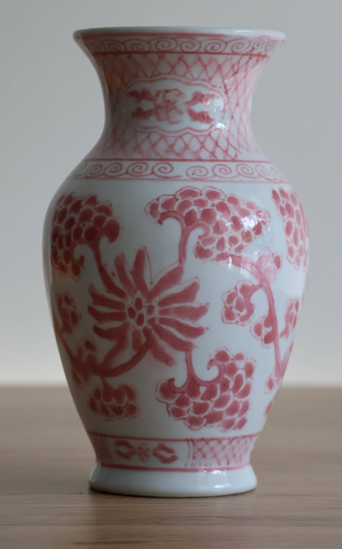 Chinese style flower vase with red and white flowers