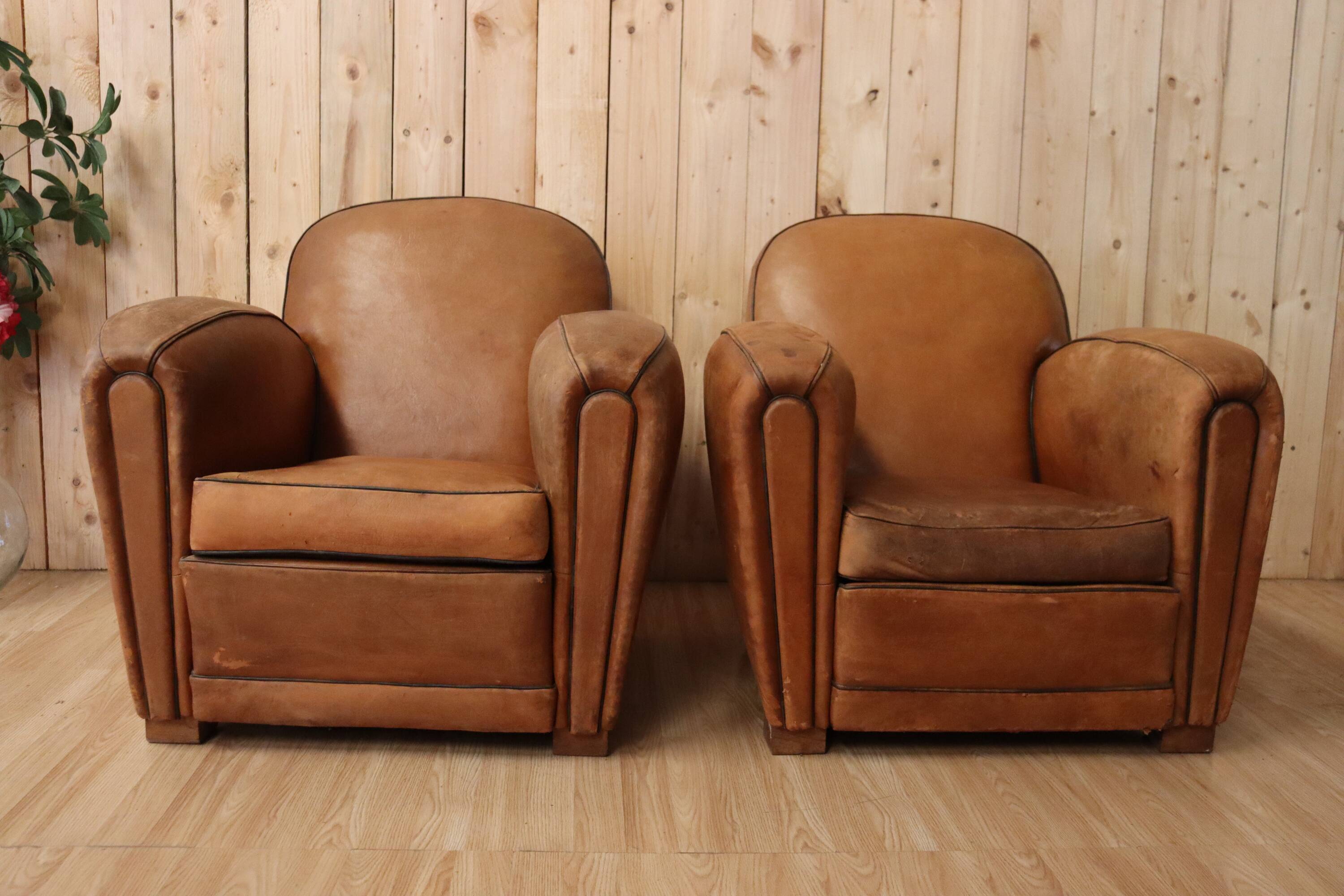 Pair of Art Deco leather club armchairs from the 1930s.