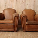 Pair of Art Deco leather club armchairs from the 1930s.
