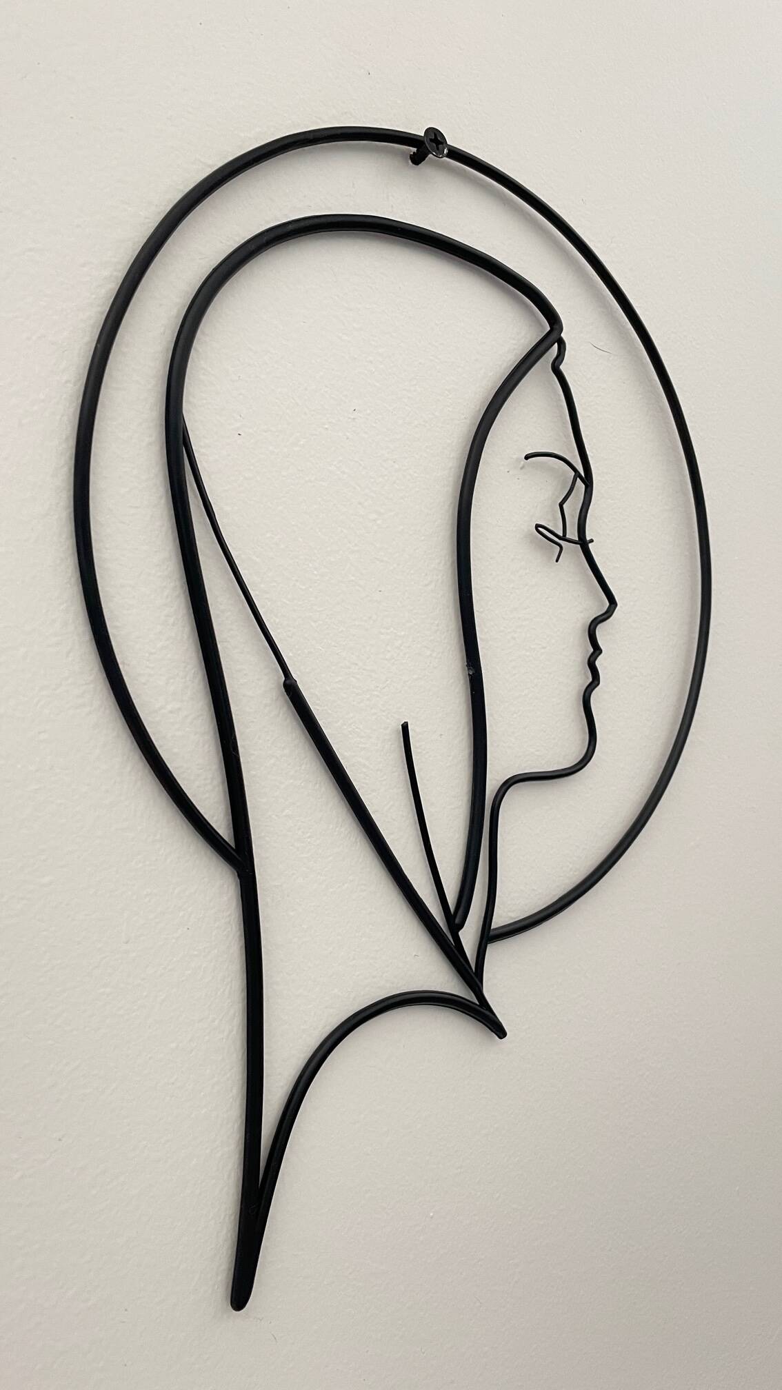 Vintage modernist wall decoration image of Saint.