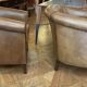 pair of camel leather club armchairs