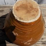 Milk broc in sandstone