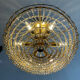 Lustre cascade en bronze et pampilles de cristal
