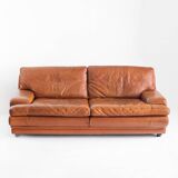 Vintage three-seater leather sofa. Edition by Roche Bobois. France, 70s-80s