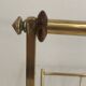 Brass and wood magazine rack, in the style of Cesare Lacca.