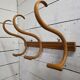 Curved wooden coat rack with 3 hooks, 1920s.