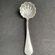 Cake tongs and spoon to sprinkle silver metal