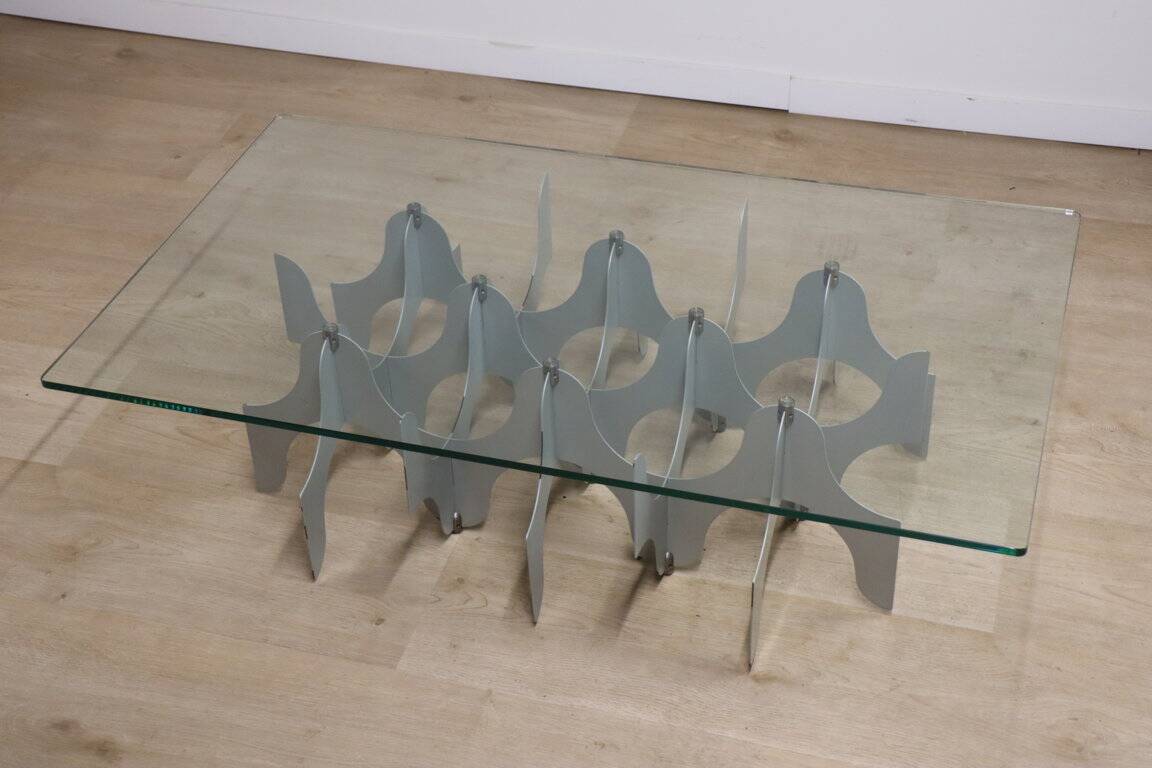 Minimalist sculptural coffee table in metal and glass