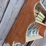 Artisanal shelf in raw wood