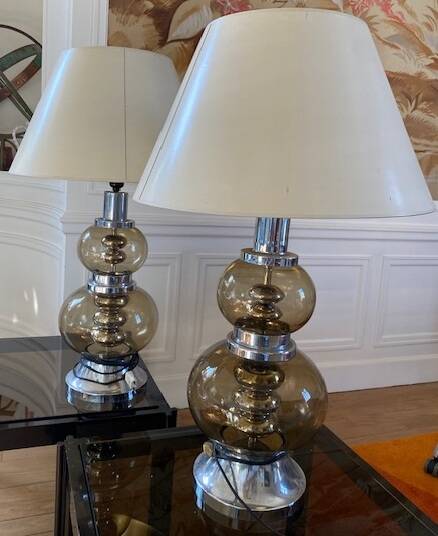 pair of smoked glass and chrome lamps