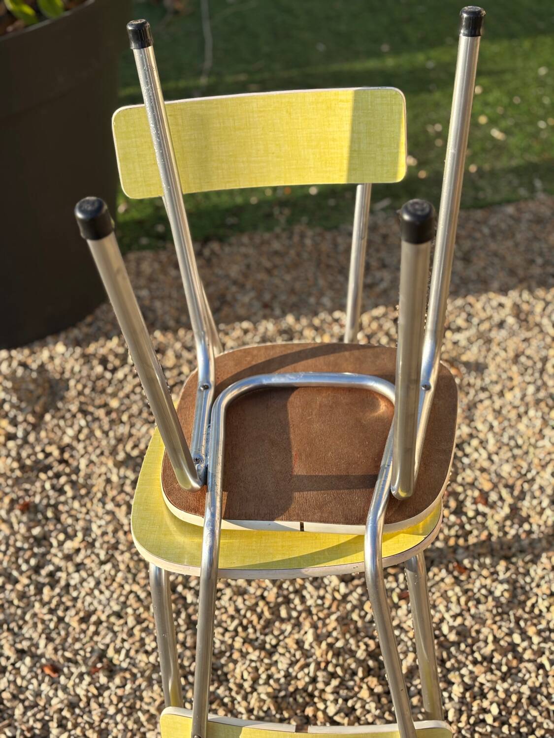 Pair of yellow Formica chairs