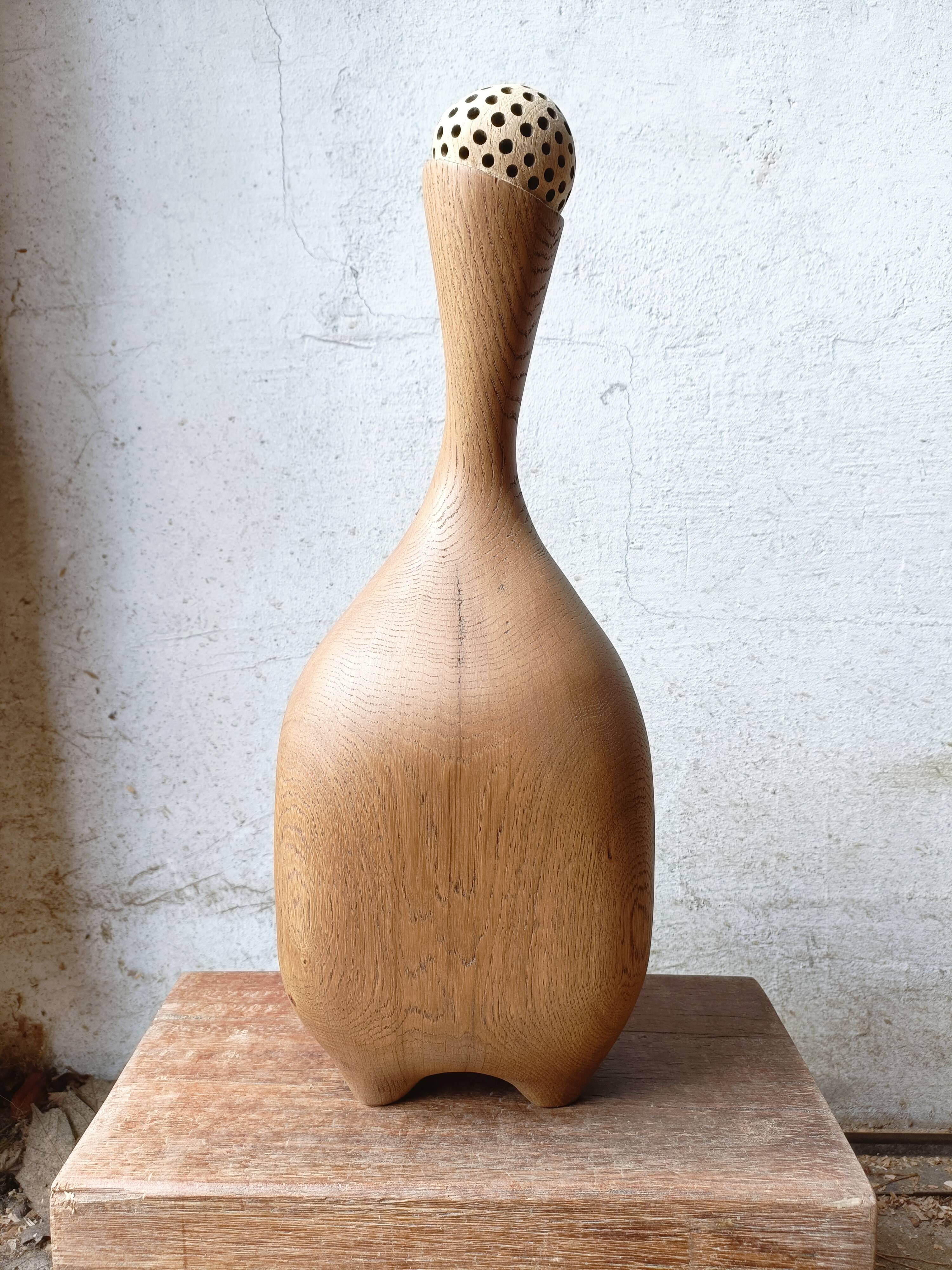 Set of two large solid oak sculptures.