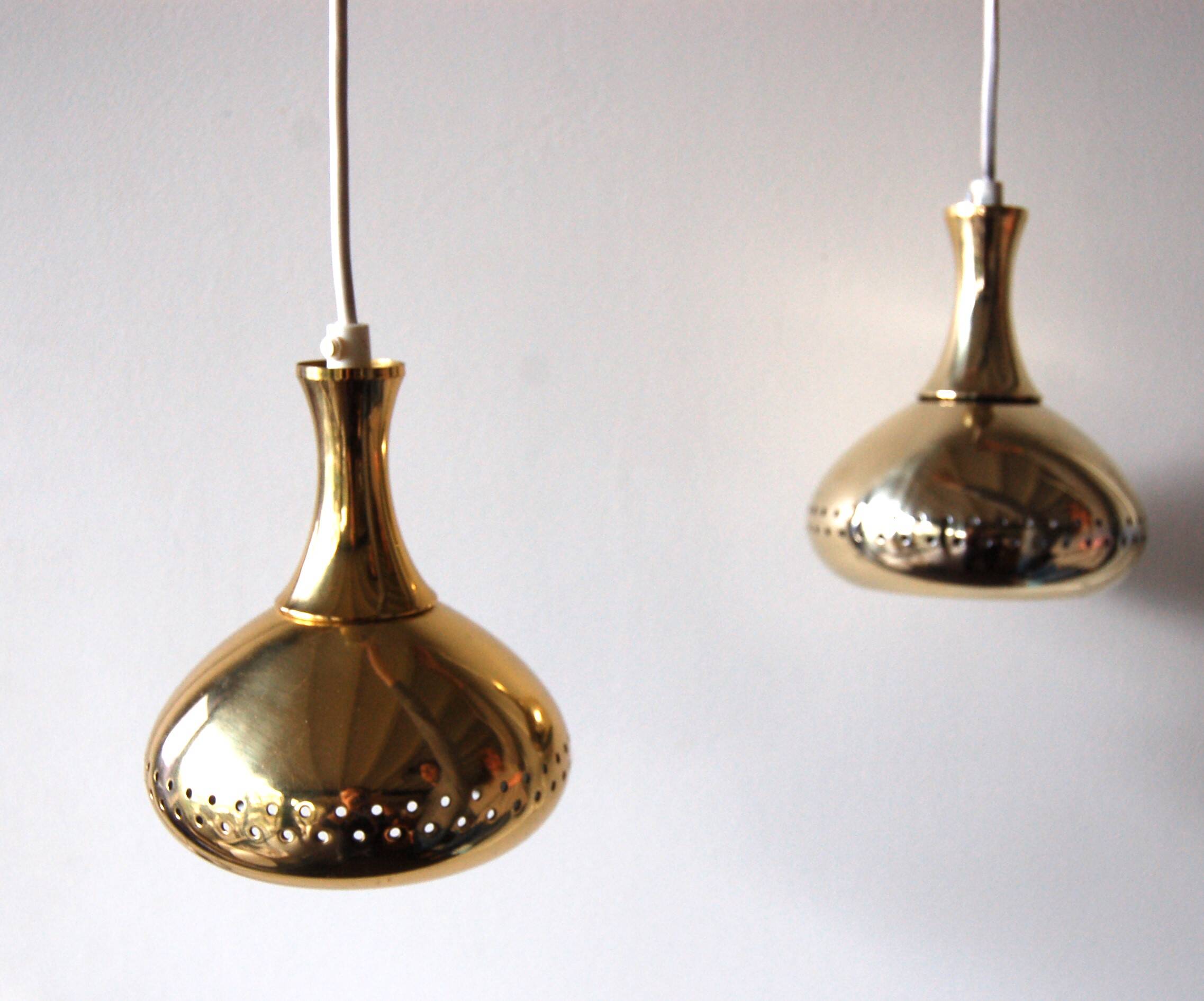 Pair of brass lamps by Hans-Agne Jakobsson, Scandinavia (Tynell Lisa Pape)