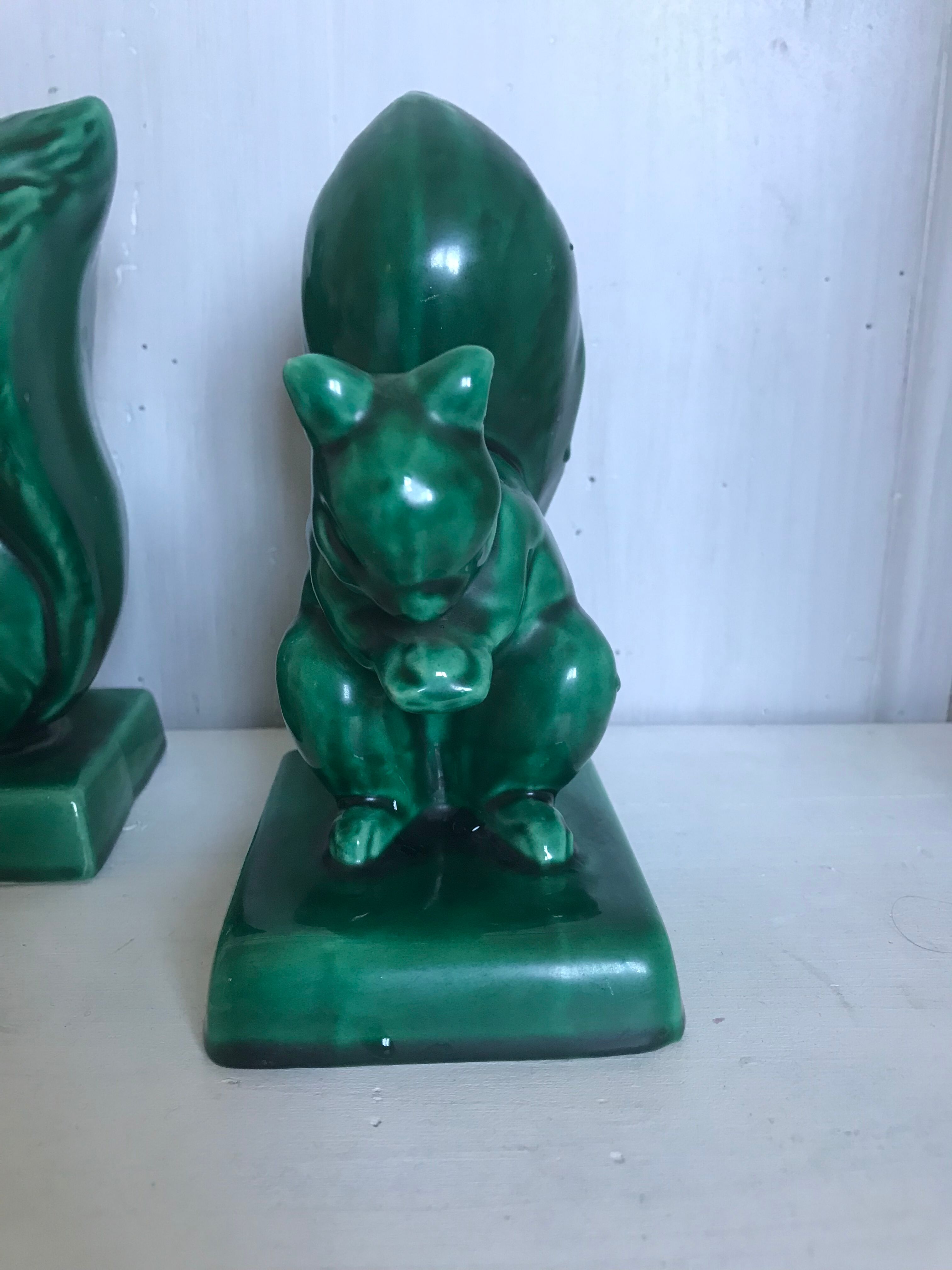 Pair of Art Deco ceramic book clamts