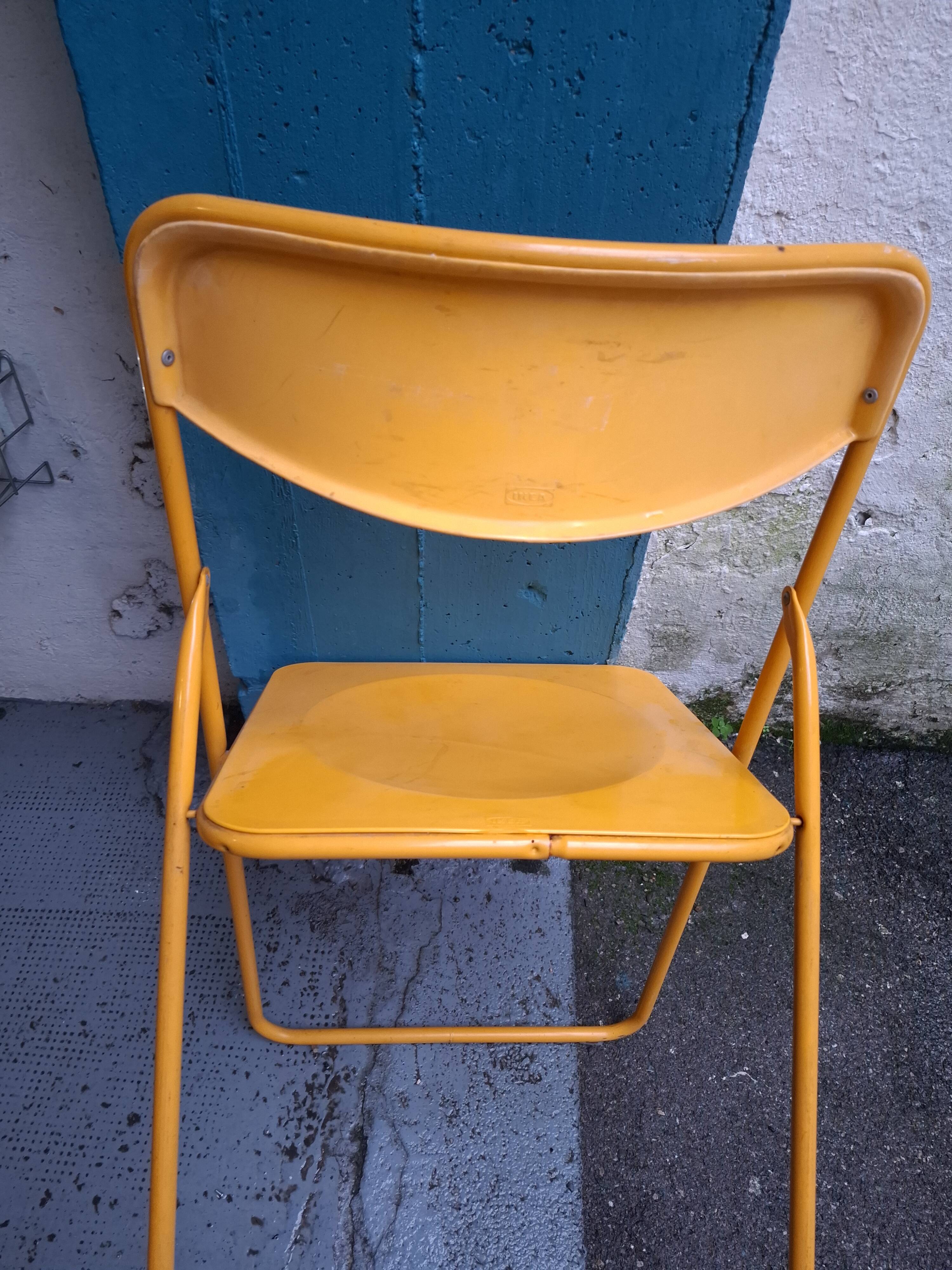 Two ikea folding chairs, niels gammelgaard