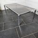 Chromed metal coffee table with smoked glass top from the 70s