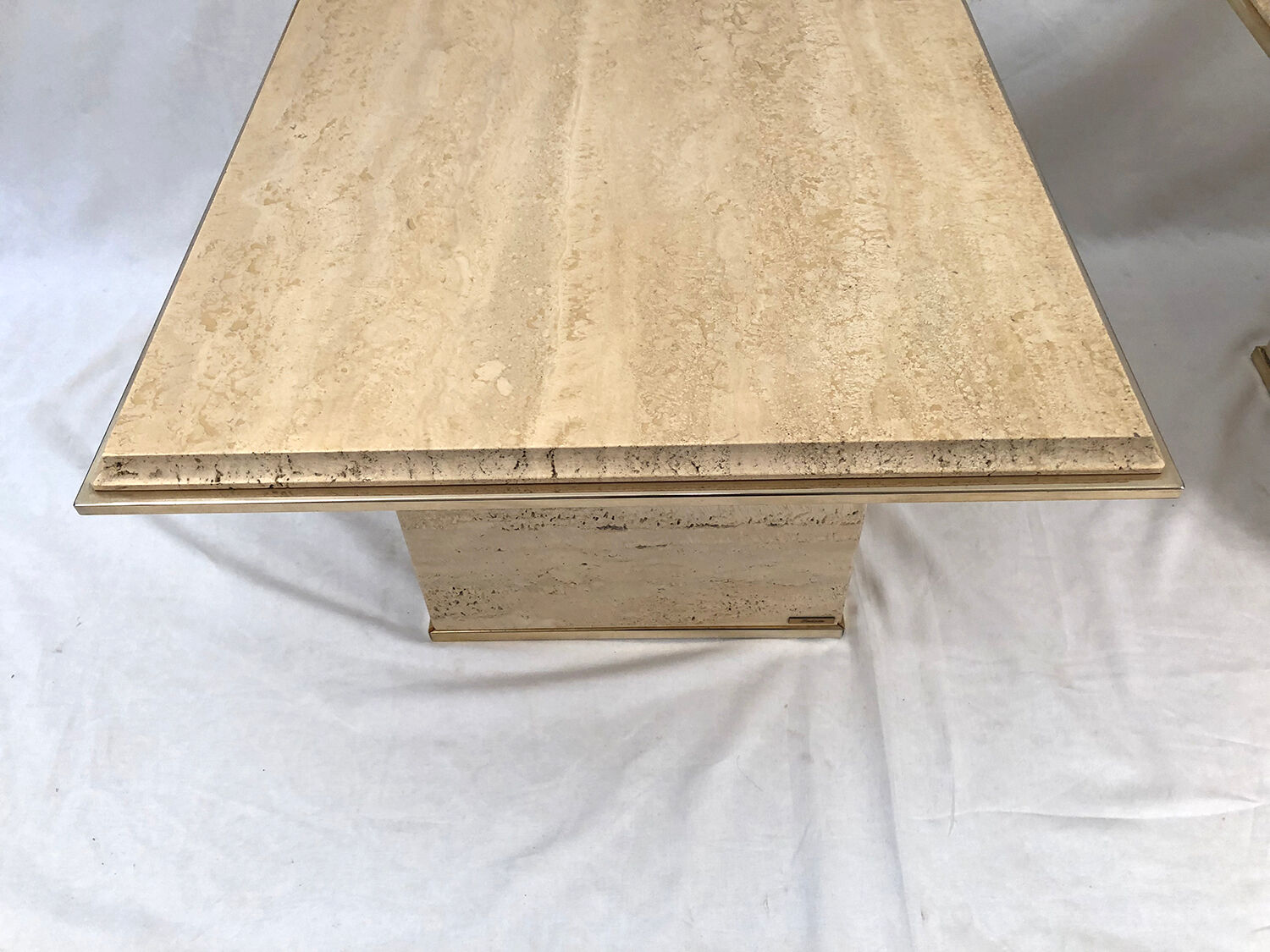 Pair of sofa ends in travertine