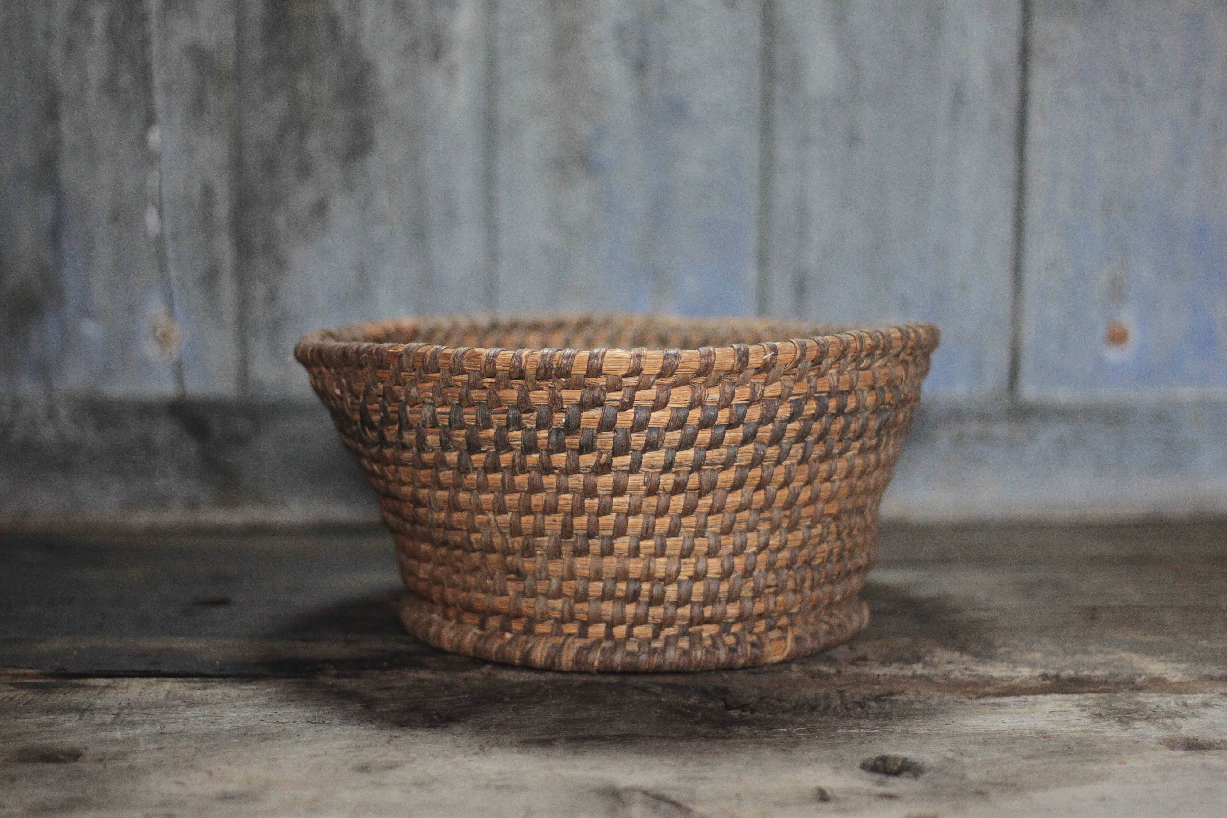 Old wicker basket, straw and bramble, woven basket, countryside, chal.