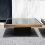 Pair of coffee tables brass black glass