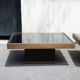 Pair of coffee tables brass black glass