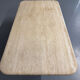 Travertine coffee table with wooden legs, Italian design from the 1970s, vintage.
