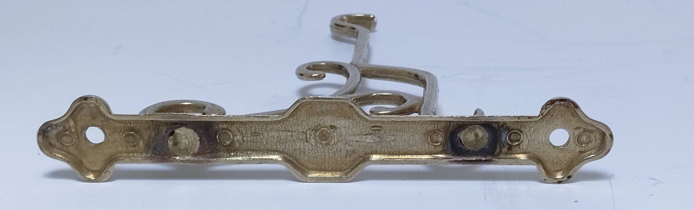 Three brass, chrome, aluminum hooks, early 20th century