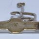 Three brass, chrome, aluminum hooks, early 20th century