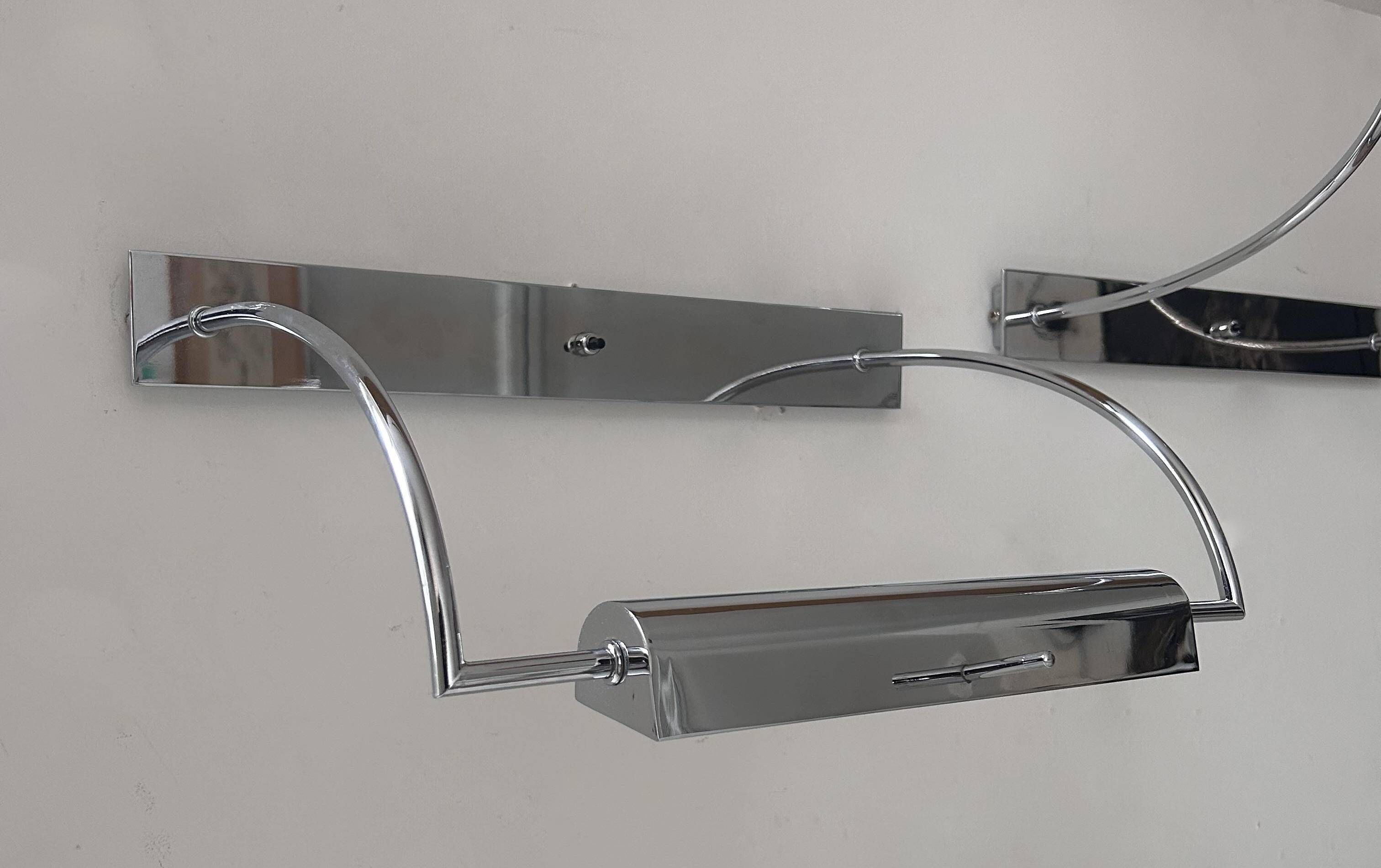 Pair of vintage adjustable wall lights, chrome metal, France 1970.