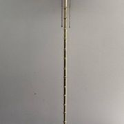 Floor lamp in faux-bamboo style, made of bronze and brass by Jacques Adnet