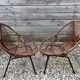 Pair of rattan armchairs, metal legs CIRCA 1950